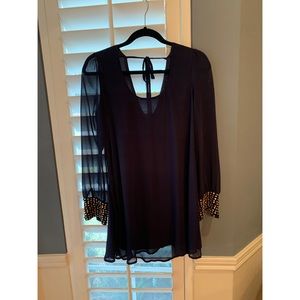 Navy dress with gold studded cuffs